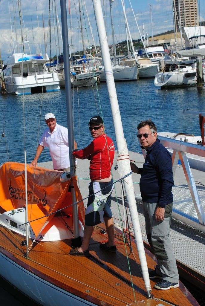 Outgoing president of the Australian Dragon Assocaition, Andrew Merrett, and his crew of Amazing Grace, Chris Kell and Charles Stanton, tidy up their boat after race one - Prince Philip Cup Regatta 2012 © Rob Cruse